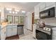 Updated kitchen boasts stainless steel appliances and an eat-in area at 137 Fox Chase Dr, Goose Creek, SC 29445