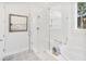 Spa-like bathroom with a large glass shower, soaking tub, and patterned floor at 1660 Siloh Dr # 472, Mount Pleasant, SC 29466