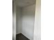 Empty closet with dark gray vinyl flooring at 110 Groves St, Walterboro, SC 29488
