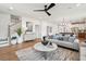 Open living space with hardwood floors and view into kitchen at 715 Maynard Ln, Summerville, SC 29486