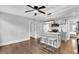 Modern kitchen with island, stainless steel appliances, and hardwood floors at 2736 Saratoga Rd, North Charleston, SC 29405