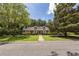 Brick home with a landscaped lawn and walkway at 103 President Cir, Summerville, SC 29483