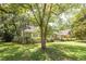 Brick home with mature trees and landscaping at 103 President Cir, Summerville, SC 29483