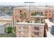Shared rooftop terrace with lounge seating and city views at 609 King St # 615, Charleston, SC 29403