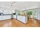 Bright kitchen with white cabinets, granite counters, and stainless steel appliances at 750 Lakenheath Dr, Mount Pleasant, SC 29464