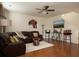 Spacious living room with sectional sofa, hardwood floors, and a large TV at 131 Tin Can Aly, Summerville, SC 29483