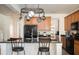 Kitchen island with granite countertop and seating for two at 131 Tin Can Aly, Summerville, SC 29483