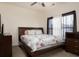 Spacious bedroom with a king-size bed and ceiling fan at 131 Tin Can Aly, Summerville, SC 29483