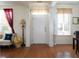 Bright entryway with hardwood floors, white door, and decorative accents at 131 Tin Can Aly, Summerville, SC 29483
