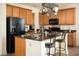 Modern kitchen with granite countertops and black stainless steel appliances at 131 Tin Can Aly, Summerville, SC 29483