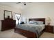 Spacious bedroom with king-size bed and wood furniture at 131 Tin Can Aly, Summerville, SC 29483