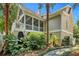 Two-story home with screened porch and landscaped yard at 512 Whilden St, Mount Pleasant, SC 29464