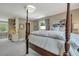 Charming bedroom with a four-poster bed and built-in shelving at 512 Whilden St, Mount Pleasant, SC 29464