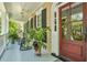 Inviting front porch with rocking chairs and lush plants at 512 Whilden St, Mount Pleasant, SC 29464