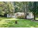 Single-wide mobile home with a deck and a large yard at 121 Paisan Rd, Summerville, SC 29483
