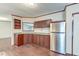 Modern kitchen featuring dark wood cabinets and stainless steel appliances at 121 Paisan Rd, Summerville, SC 29483