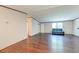 Living room with a leather couch and wood flooring at 121 Paisan Rd, Summerville, SC 29483