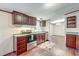 Modern kitchen featuring stainless steel appliances and dark wood cabinetry at 121 Paisan Rd, Summerville, SC 29483