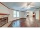 Open living room showcasing hardwood floors and views into the kitchen at 121 Paisan Rd, Summerville, SC 29483