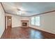 Bright living room with hardwood floors and a stone fireplace at 121 Paisan Rd, Summerville, SC 29483