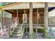 Home's exterior with wooden stairs and porch at 121 Paisan Rd, Summerville, SC 29483