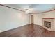 Living room with a stone fireplace and dark wood flooring at 121 Paisan Rd, Summerville, SC 29483