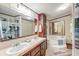 Double vanity and corner bathtub in this updated bathroom at 121 Paisan Rd, Summerville, SC 29483