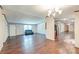 Open living room and dining area with wood floors and a view of the kitchen at 121 Paisan Rd, Summerville, SC 29483