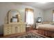 Bedroom with a dresser, large mirror, and a TV at 2363 Ranger Dr, Cross, SC 29436