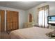 Bedroom with a dresser, large mirror, and a TV at 2363 Ranger Dr, Cross, SC 29436