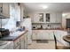 Kitchen with white cabinets and appliances at 2363 Ranger Dr, Cross, SC 29436