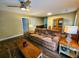 Living room with hardwood floors, sofa, and built-in shelving at 212 Hickory St, Walterboro, SC 29488