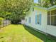 Backyard of the property showing a shed and grassy area at 212 Hickory St, Walterboro, SC 29488