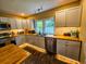 Updated kitchen with stainless steel appliances and a large island at 212 Hickory St, Walterboro, SC 29488