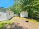 Large backyard with shed and fire pit at 212 Hickory St, Walterboro, SC 29488