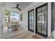 Covered porch with outdoor dining area and view at 3025 Southerly Way, Johns Island, SC 29455