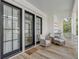 Relaxing porch with wicker chairs and access to the interior at 3025 Southerly Way, Johns Island, SC 29455