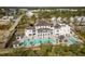 Aerial view of a luxury community with a large pool and clubhouse at 3025 Southerly Way, Johns Island, SC 29455