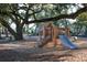 Wooden playground structure with slide under large oak tree at 3025 Southerly Way, Johns Island, SC 29455