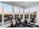 State-of-the-art fitness room with cardio equipment and stunning water views at 3025 Southerly Way, Johns Island, SC 29455