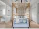 Spacious bedroom with a statement canopy bed and light, airy decor at 3025 Southerly Way, Johns Island, SC 29455