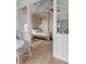View into bedroom with a large canopy bed and light hardwood floors at 3025 Southerly Way, Johns Island, SC 29455