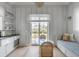 Charming kitchen with built-in banquette seating and a view of the water at 3025 Southerly Way, Johns Island, SC 29455