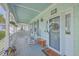Inviting front porch with rocking chairs, perfect for relaxing at 1374 Black River Dr, Mount Pleasant, SC 29466