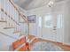 Bright entryway with staircase and decorative rug at 1374 Black River Dr, Mount Pleasant, SC 29466