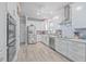 Bright kitchen featuring stainless steel appliances and white cabinetry at 1374 Black River Dr, Mount Pleasant, SC 29466