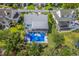 Aerial view of house with pool, deck and surrounding neighborhood at 1374 Black River Dr, Mount Pleasant, SC 29466