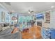 Spacious living room with hardwood floors, fireplace, and built-in shelving at 1374 Black River Dr, Mount Pleasant, SC 29466