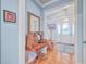 Hallway showcasing unique decor and hardwood floors at 1374 Black River Dr, Mount Pleasant, SC 29466