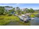 Private boat dock featuring a covered area and lift for a boat at 1374 Black River Dr, Mount Pleasant, SC 29466